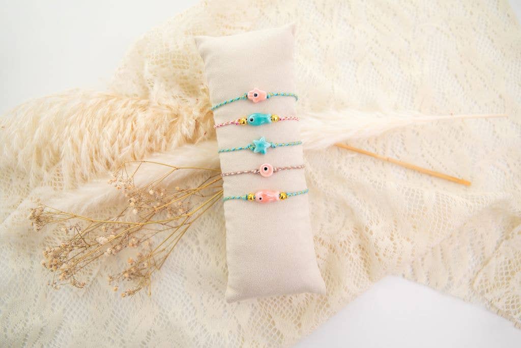 Bracelet en forme de poisson crème - Image 3